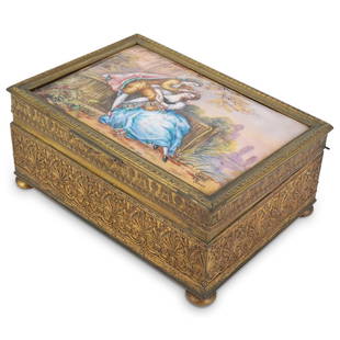 Signed Victorian French Enamel and Bronze Box: DESCRIPTION: A Victorian French bronze box features le de fleur decorations along the body with ornate vine patterns, the lid painted with an enamel scene displaying courting couples, signed at the bo