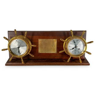 Vintage German Time & Tide Co Nautical Chronometer And Tide Clock: DESCRIPTION: Vintage Time & Tide Co chronometer and tide clock, each a separate mechanism mounted in a ship's wheel form housing adorning a wooden board bearing a central brass plaque. Twelve hour