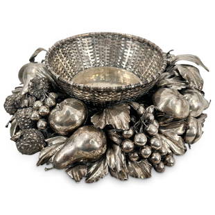 Gianmaria Buccellati Fruit & Foliate Silver Centerpiece: DESCRIPTION: Substantial Gianmaria Buccellati silver centerpiece bowl having woven circular basket centered by sculpted silver fruit and foliate, comprising of various leaves and stemmed fruits to