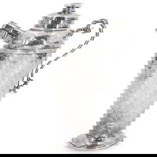 Antique 900 Silver Hammered Cocktail Shaker: DESCRIPTION: Antique 900 silver hand hammered cocktail shaker with ornate scrolling handle, lidded pouring spout and lidded top. Marked at underside with "0900" in shield CIRCA: Early 20th Cent.