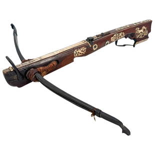 Rare 17th Cent. Stag Horn Crossbow, Signed & Dated: DESCRIPTION: A rare crossbow crafted with a walnut wooden foundation and lavishly decorated with antler inlay. Garnished throughout by detailed hunting scenes and floral medallions, further mounted