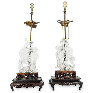 Pair of Chinese Rock Crystal Phoenix Lamps: DESCRIPTION: A pair of Chinese lamps comprised of rock crystal carvings depicting phoenixes. The sculptures mounted atop original carved bases and later mounted stands. Electrified. CIRCA: Late 19th