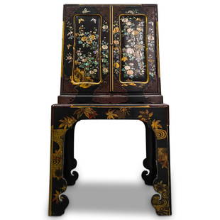 19th Cent. Japanese Inlaid and Lacquered Cabinet on Stand: DESCRIPTION: A 19th cent Japanese lacquered cabinet fitted atop a matching stand, decorated with corner brass mountings, floral and butterfly motifs comprised of abalone and mother of pearl inlay.