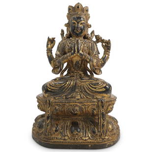 17th Cent. Chinese Gilt Zitan Wood Seated Shadashri Buddha: DESCRIPTION: A Chinese carved buddha composed of a Zitan wood foundation, depicting Shadashri seated atop a tiered base, completed with a gilt finish. CIRCA: 17th Cent. ORIGIN: China DIMENSIONS: H: