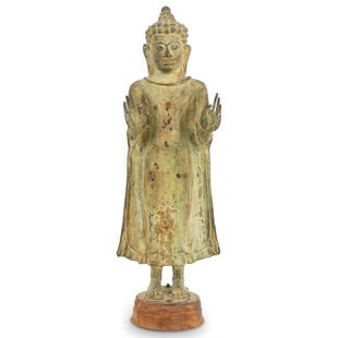 8th/9th C. Rare Important Mon-Dvaravati Copper Alloy Buddha: DESCRIPTION: 8th-9th Century exceptional rare and important Mon-Dvaravati standing Buddha composed of copper alloy with long cloak, hands in abhaya mudra, and the hair arranged in prominent curls