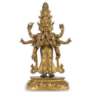 17th/18th C. Fine Gilt Bronze Sino-Tibetan Avalokitesvara: DESCRIPTION: 17th-18th Century gilt bronze Sino-Tibetan figure of Avalokitesvara an eleven-headed, eight armed deity stands on a lotus base, his principal hands in Anjali Mudra, wearing long layered f