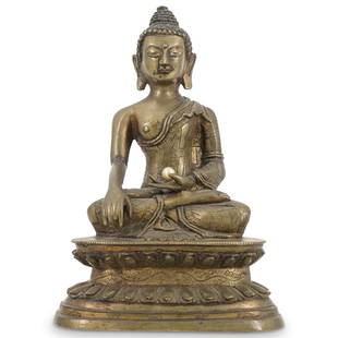 19th Cent. Fine Tibetan Gilt Bronze Shakyamuni Buddha: DESCRIPTION: Fine Tibetan gilt bronze Shakyamuni Buddha in the dhyanasana position posed with pearl (Added Later) in hand, with intricate patchwork flowing robe, seated on a double lotus throne base.