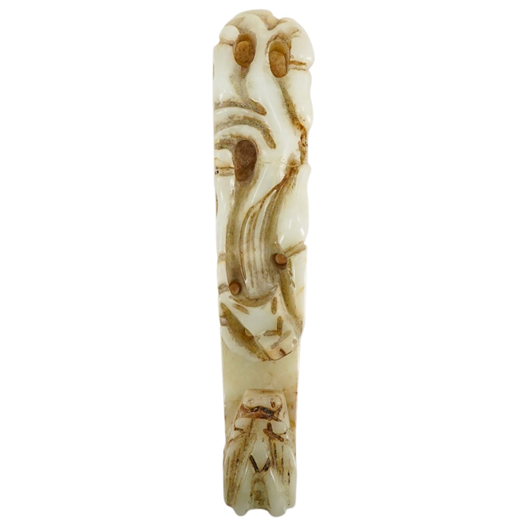Antique Chinese Carved Jade Dragon Belt Buckle: DESCRIPTION: Antique belt buckle carved from jade in the form of two dragons: one at the head and one over the buckle's button. CIRCA: Late 19th to mid-20th Century ORIGIN: China DIMENSIONS: H: 1" W: 