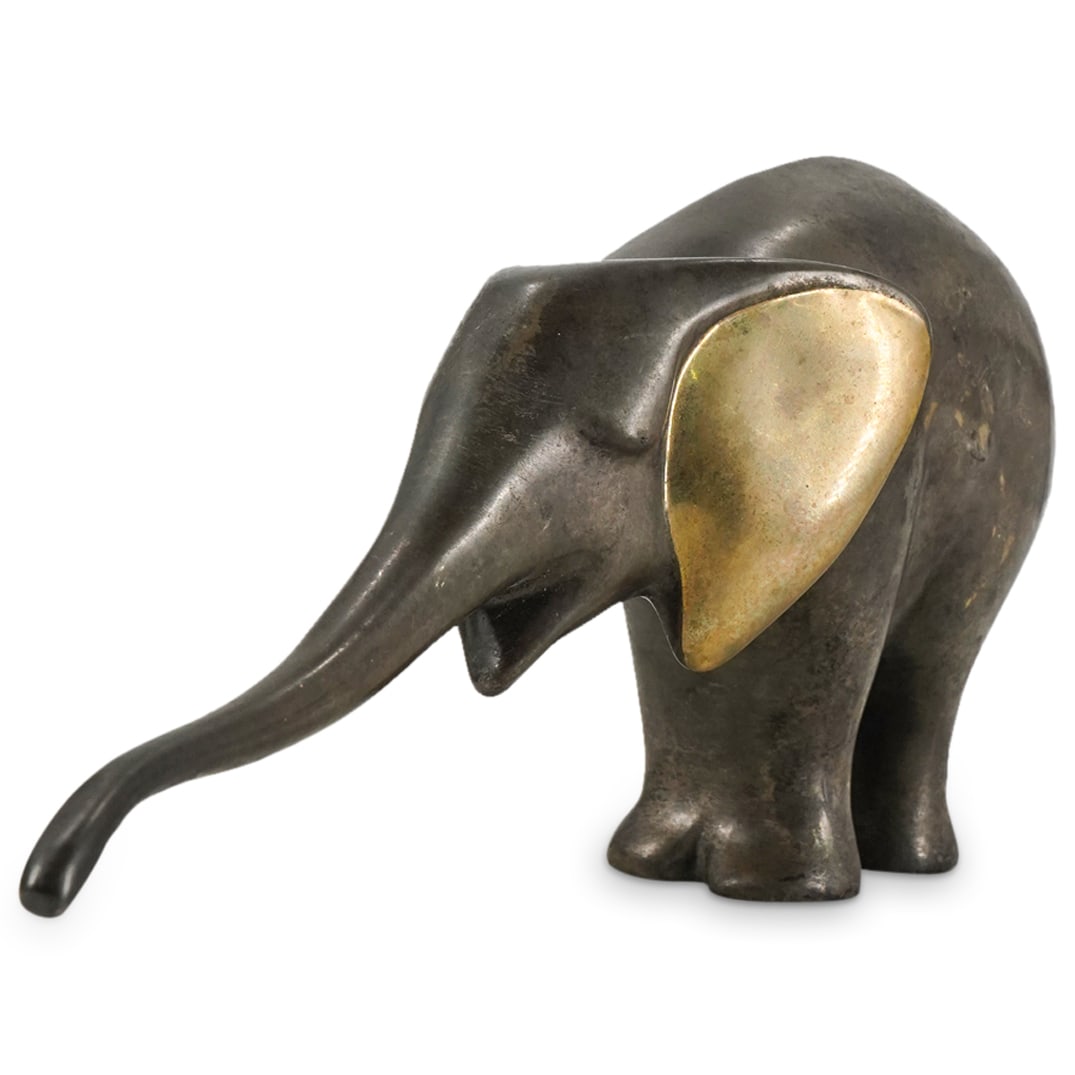 Loet Vanderveen (Dutch, 1921-2015) Bronze Elephant: DESCRIPTION: Bronze sculpture by Dutch animaleer Loet Vanderveen depicting an elephant with gilt ears. Signed on underside of neck and numbered 27 of 750 thereon. CIRCA: 20th to early 21st century ORI
