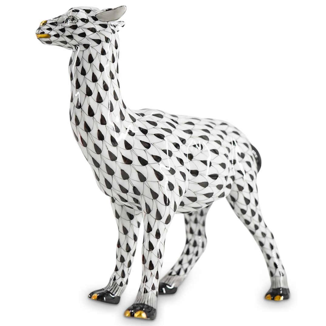 Herend Porcelain "Llama" Black Fishnet Figurine: DESCRIPTION: Herend porcelain figurine depicting a "Llama" and featuring black fishnet pattern and gilded accents. Style number: #15662. Marked with Herend hallmark on the underside. CIRCA: 20th Centu
