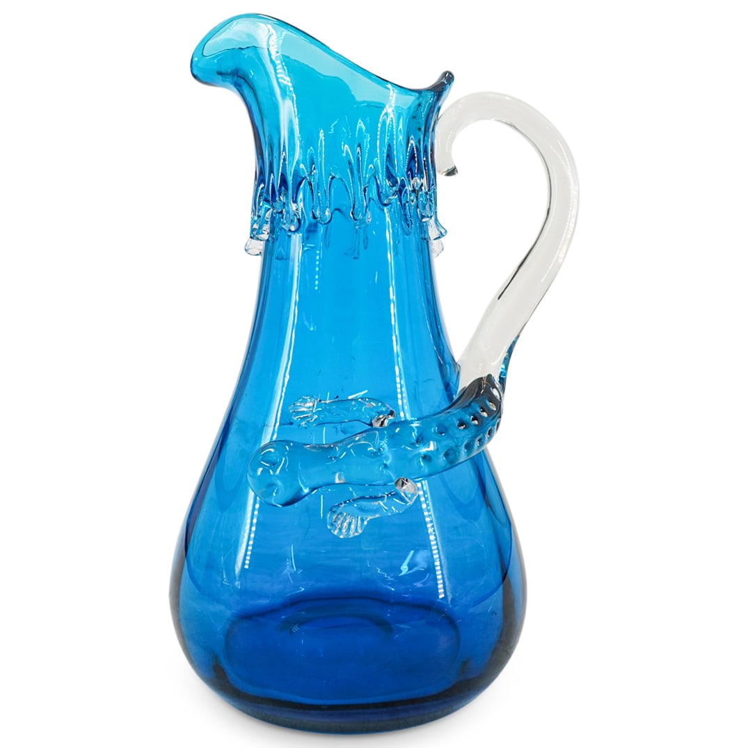 Murano Blue Art Glass Pitcher W/ Reptile Handle: DESCRIPTION: Murano art glass large pitcher in midnight blue colored glass, with clear glass melting applied accents on the rim, and an animal shaped handle depicting a reptile. CIRCA: 20th Century OR