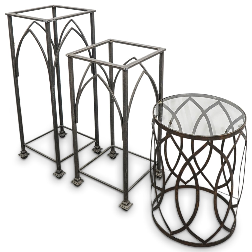 (3Pc) Metal & Glass Pedestal Tables: DESCRIPTION: Group of three metal and glass pedestal tables with square and round forms featuring arch and oval designs. CIRCA: 20th Cent. ORIGIN: Continental DIMENSIONS: (Tallest) H: 36.5" x W: 14.25