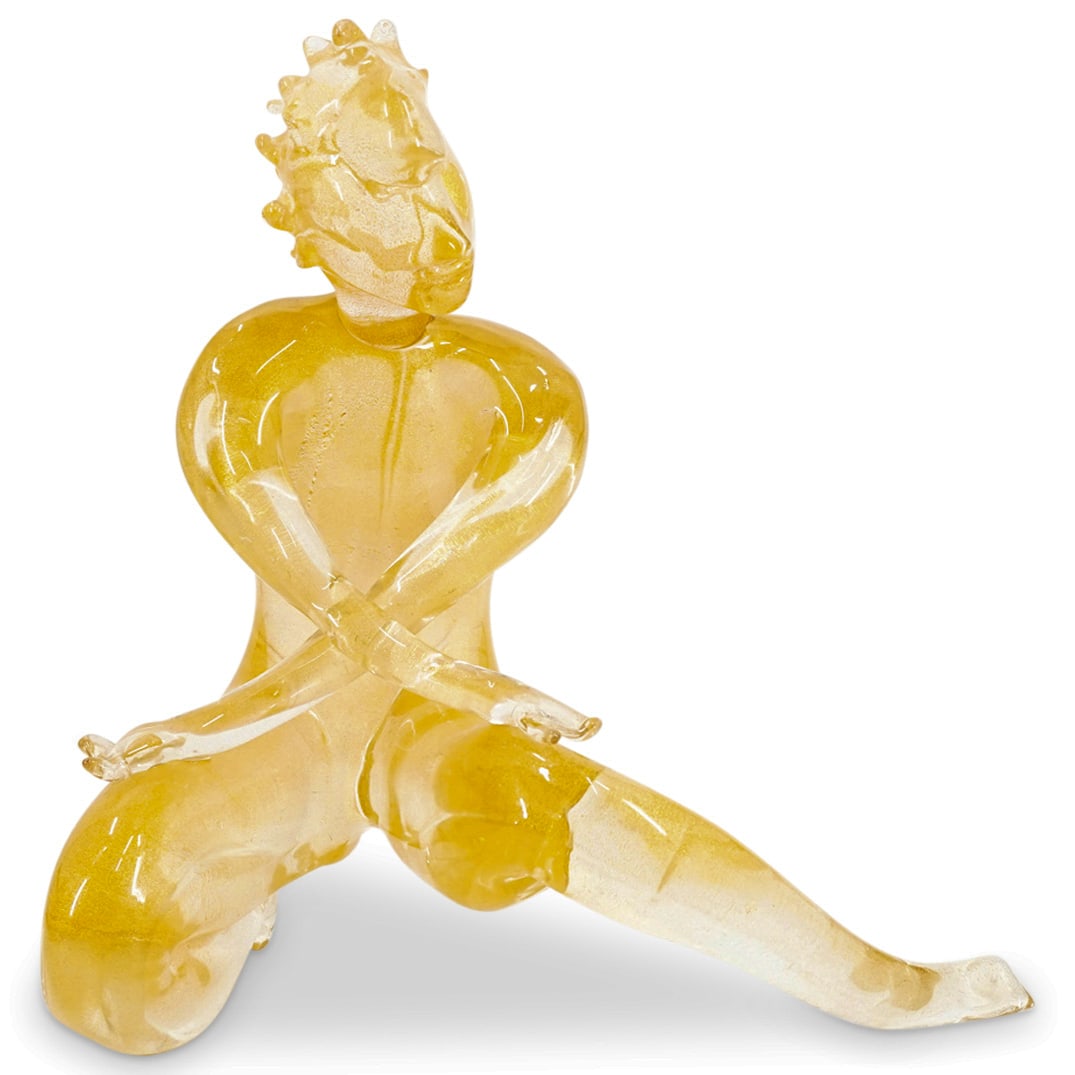 Seguso Vetri D'Arte Murano Art Glass Nude Figural Sculpture: DESCRIPTION: Seguso Vetri D'Arte Murano Glass Figure of a Squatting Nude. Modeled with crossed arms and head to one side, in colorless glass, internally decorated with gold foil flecks, labeled. CIRCA