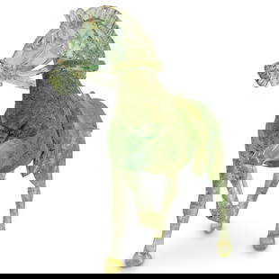 Pino Signoretto Murano Scavo Glass Figure Of A Horse: DESCRIPTION: In transparent green colored glass, with a corroded finish and gold foil fleck, modeled in Chinese style, with one hoof raised. Signed on underside. CIRCA: 20th century or later ORIGIN: I