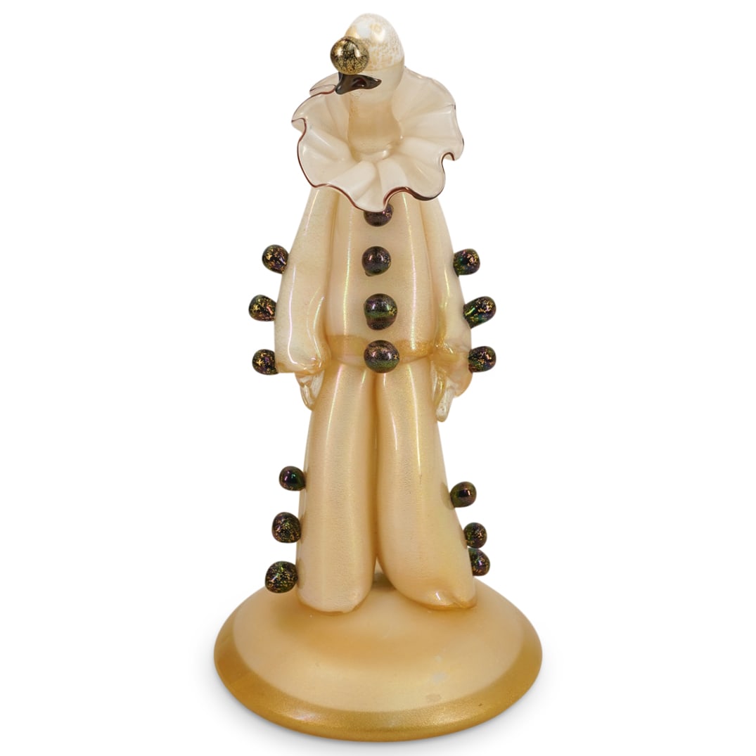(Gino Cenedese Glass Commedia Dell'arte Figure Of Clown: DESCRIPTION: in lattimo and colorless glass with gold foil flecks, wearing a shirt with long sleeves, pants, hat and a mask, the outfit with applied dark amethyst colored oversized ball-shaped buttons