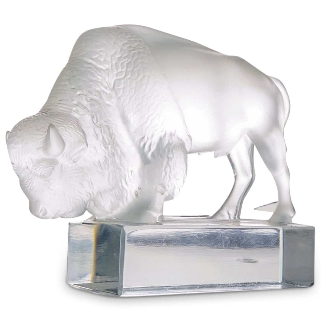Lalique Bison Glass Figurine Paperweight: DESCRIPTION: Lalique Bison Glass Figurine Paperweight. Marked "Lalique France". CIRCA: 20th Century ORIGIN: France DIMENSIONS: H: 4" CONDITION: Good Condition Unless otherwise stated, all information 