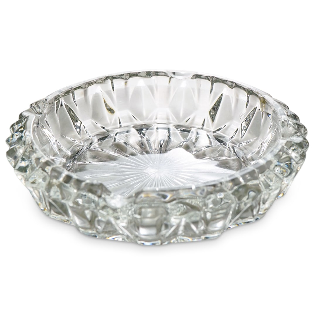 French Molded Glass Ashtray: DESCRIPTION: In colorless glass. Marked with molded "France" on underside. CIRCA: 20th century or later ORIGIN: French DIMENSIONS: H: 1.25" Diameter: 5.75" CONDITION: Chips to interior rim. Unless oth