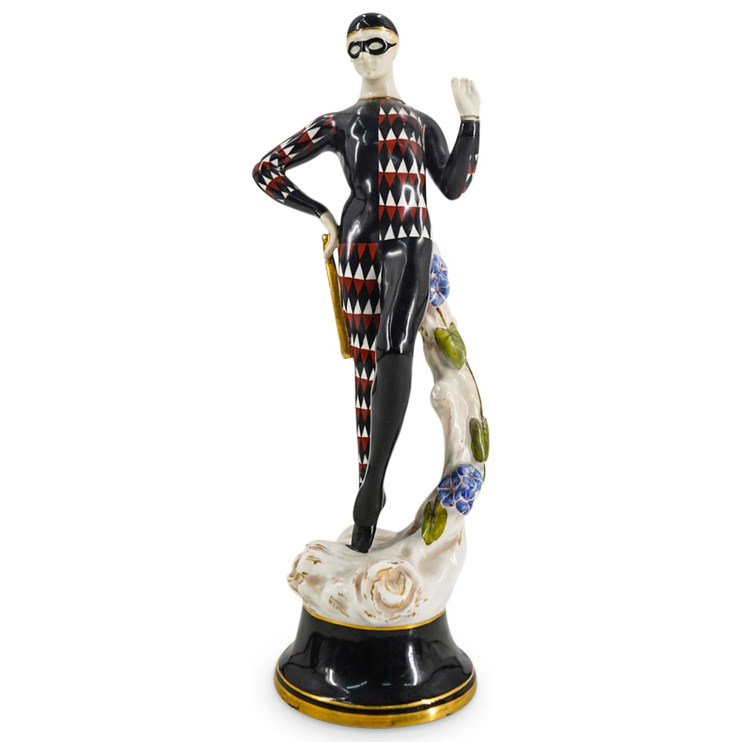 Royal Worcester Harlequin Porcelain Figurine: DESCRIPTION: Royal Worcester Porcelain Figure of a Harlequin. Stamped on underside with Royal Worcester hallmark and numbers 661900, and 2680. CIRCA: 20th Century ORIGIN: England DIMENSIONS: H: 10" CO