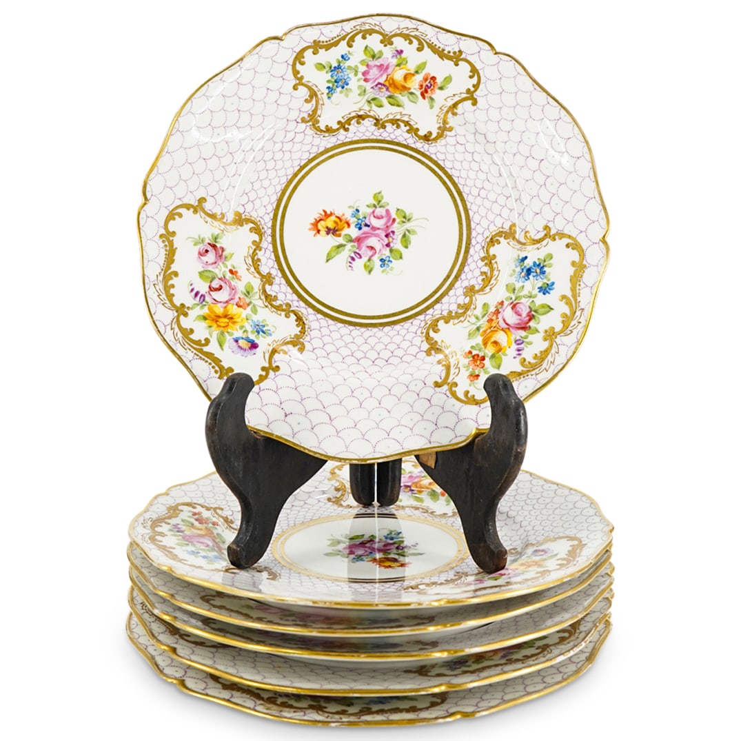 (6 Pc) Welsh Swansea Nantgarw Plates: DESCRIPTION: Six piece set of Swansea Nantgarw porcelain plates, each featuring floral motifs around lip and in well framed by gilt borders surrounded by arching dotted purple patterns. CIRCA: 19th Ce