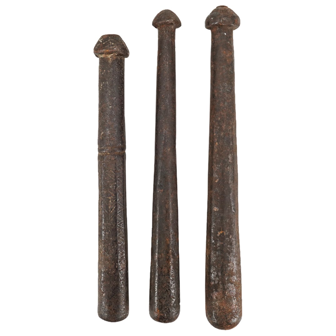 (3 Pc) 19th Century American Wrought Iron Pestles: DESCRIPTION: Three antique wrought iron pestles, each featuring a long, hard shaft surmounted by a smooth, rounded head. One pestles sports foliage designs on its sides. CIRCA: 19th Century ORIGIN: US