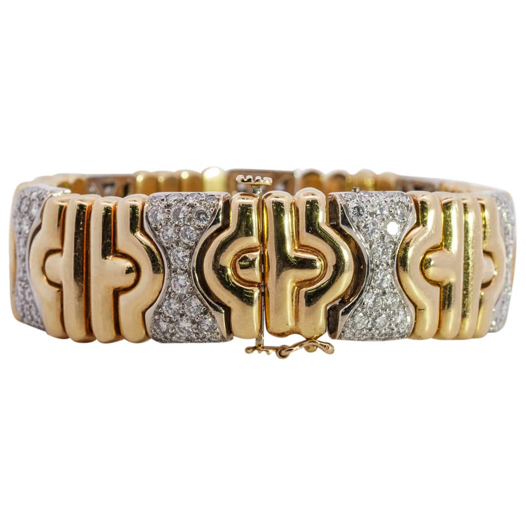 Bvlgari Style 18k Gold and Diamond Bracelet: DESCRIPTION: A Bvlgari style 18k yellow gold bracelet in the "Parentessi" design, features alternating gold and diamond inset links amounting to approx. 2cts total. Stamped "18k" along the closure. To