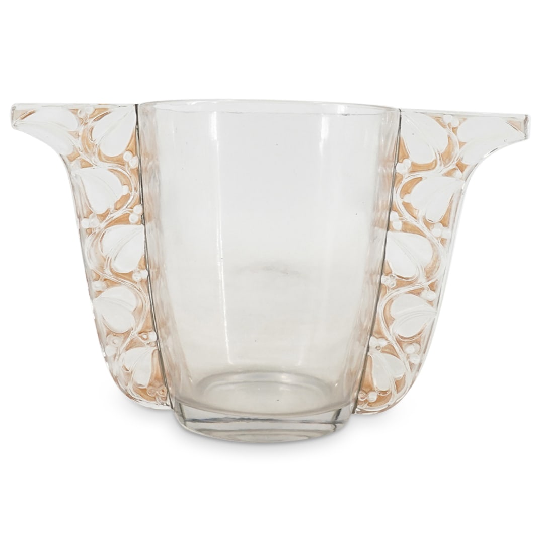 Rene Lalique (French, 1860-1954). "Honfleur" Vase: DESCRIPTION: Rene Lalique (French, 1860-1954). "Honfleur" vase in clear and frosty glass with a light sepia patina. Decorated with berries and leaves at each handle. Wheel cut "R. Lalique France" and 
