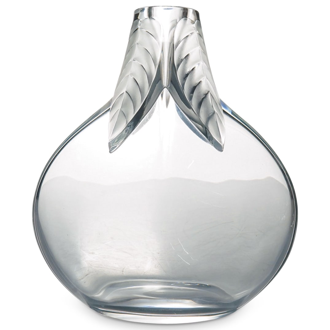 Lalique Clear And Frosted Vase In A Bulbous Shape: DESCRIPTION: Lalique clear and frosted vase in a bulbous shape conforming to a narrow mouth opening decorated with 4 large hanging leaves. Signed "Lalique France" in script on the bottom. CIRCA: 1970-
