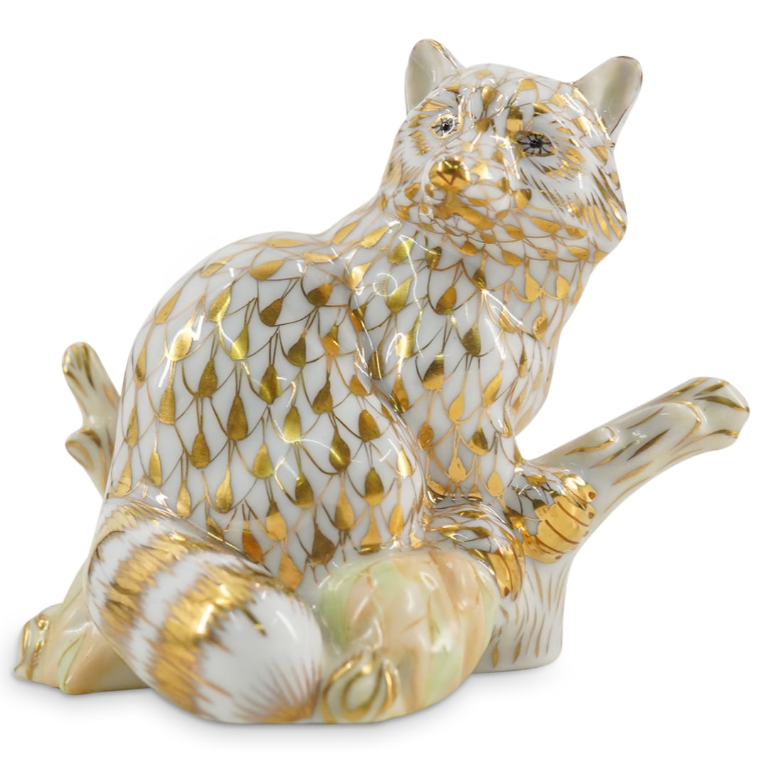 Herend Porcelain "Raccoon" Gold Fishnet Figurine: DESCRIPTION: Herend Porcelain "Raccoon" Gold Fishnet Figurine Herend porcelain figurine depicting a "Raccoon" and featuring gold fishnet pattern and gilded accents. Style number: #15854. 2004 Collecto