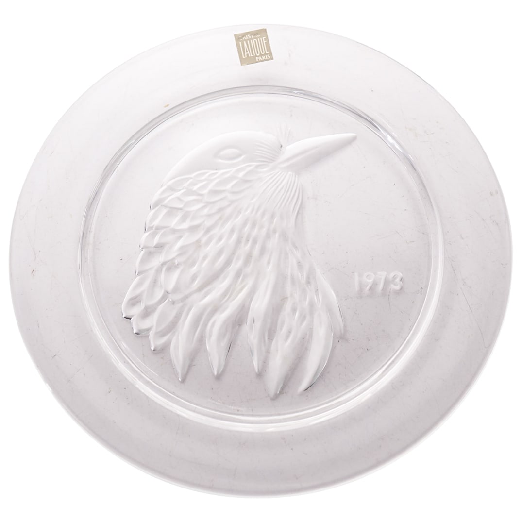 Lalique France Collector Plate In Clear And Frosty Glass: DESCRIPTION: Lalique France collector plate in clear and frosty glass with original box. Year 1973. Signed "Lalique France" in script. CIRCA: 1973 ORIGIN: France DIMENSIONS: D: 8.125" CONDITION: Excel