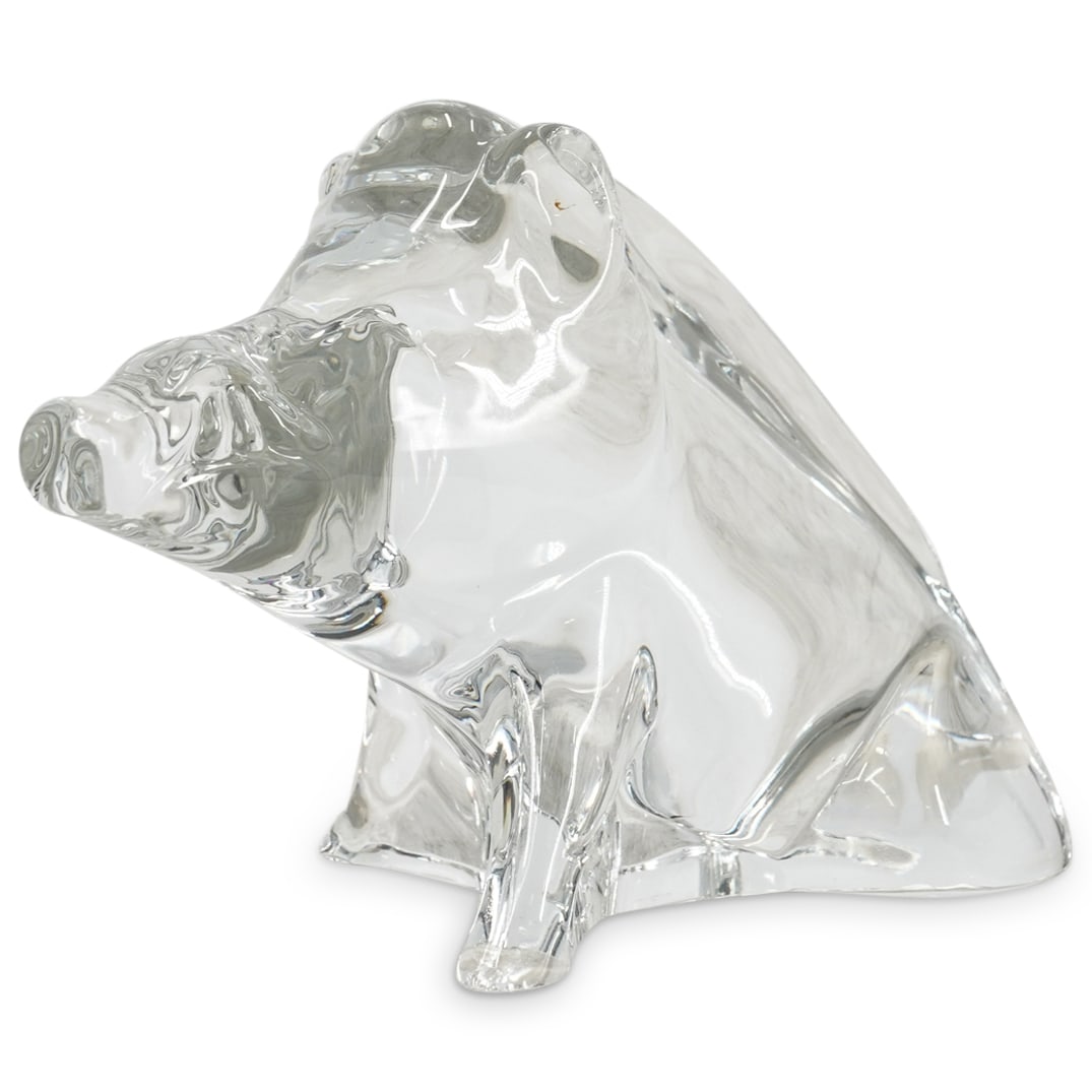 Baccarat Crystal Boar Figurine: DESCRIPTION: Baccarat colorless crystal figurine depicting a seated boar. Marked on underside. CIRCA: 20th century or later ORIGIN: French DIMENSIONS: H: 4" W: 3" L: 6.25" CONDITION: Moderate chip to 
