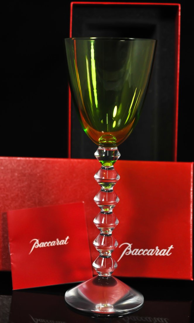 Large colored crystal wine goblet by Baccarat: DESCRIPTION: Large colored (olive green) crystal wine goblet by Baccarat, footed on a crystal clear steam and base. Hallmarked underneath the traditional Baccarat France circular mark and signed on th