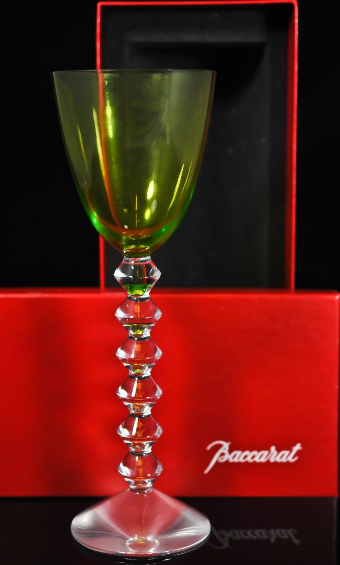 Large colored crystal wine goblet by Baccarat: DESCRIPTION: Large colored (olive green) crystal wine goblet by Baccarat, footed on a crystal clear steam and base. Hallmarked underneath the traditional Baccarat France circular mark and signed on th