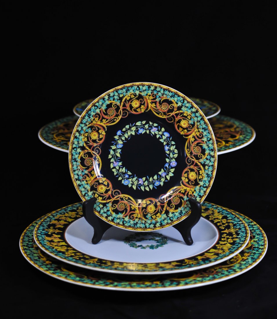 Set of 21 Rosenthal porcelain by Versace "Gold Ivy: DESCRIPTION: Set of 21 "gold ivy" Rosenthal porcelain dinner set by famous Italian designer Versace. 1 footed serving platter (H:4.25: and 13" in diameter), 4 extra large plates (12.25" in diameter),