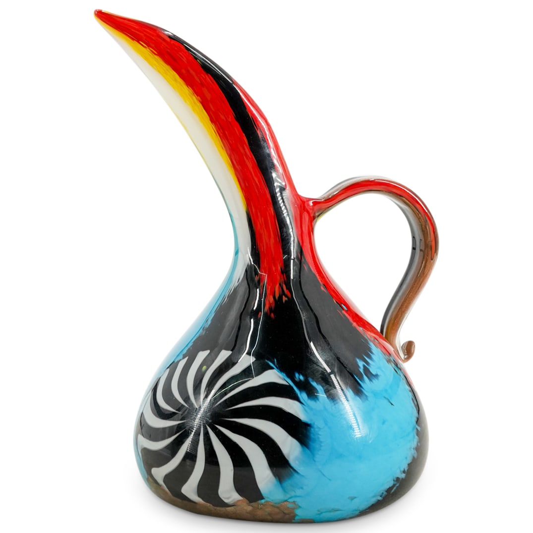 Dino Martens For Aureliano Toso Murano Glass Oriente Ewer: DESCRIPTION: With polychrome internal decoration and elongated spout. Unsigned. CIRCA: 1950s ORIGIN: Italian DIMENSIONS: H: 11.75" W: 7.25" L: 9" CONDITION: Great condition. Unless otherwise stated, a