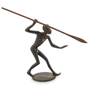 Richard Rohac (Austrian, 1906–1956) Bronze: DESCRIPTION: Richard Rohac (Austria:1906–1956). A bronze figure of a Nubian ready to throw a spear mounted on a round base. Stamped "Made in Austria" as well as the "RR" stamp. CIRCA: Mid 20th centu