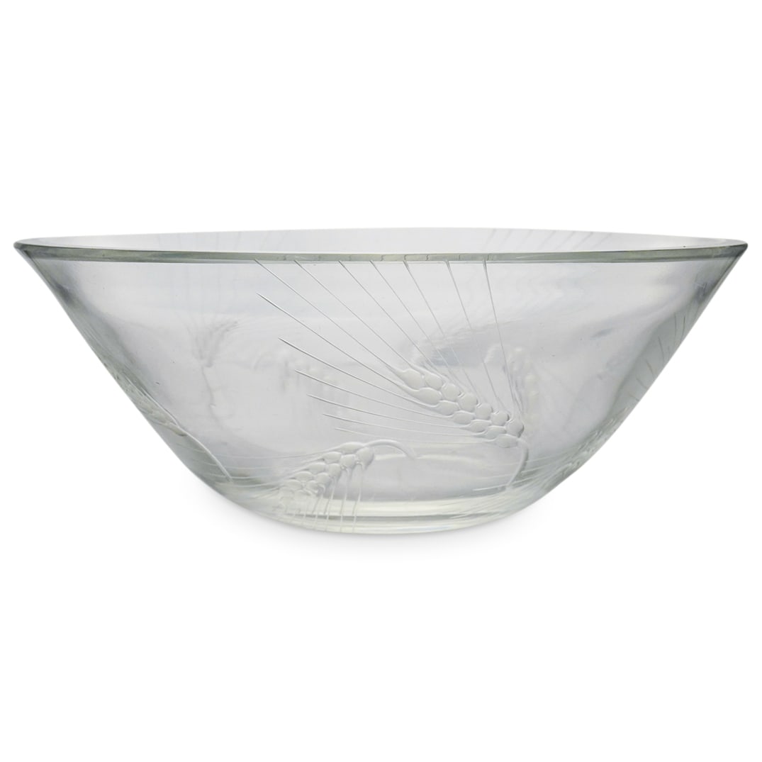 Lalique France Crystal Bowl In Polished Glass: DESCRIPTION: Lalique France crystal bowl in polished glass decorated with a motif of wheat all around. Signed "Lalique France" in script on the bottom. Height 3 1/4 inches. Diameter 8 1/2 inches. CIRC