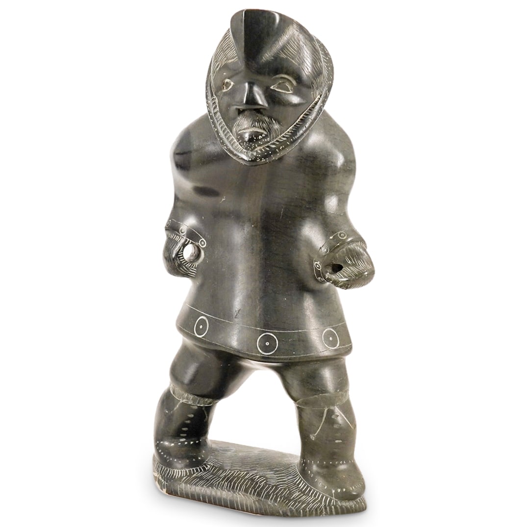 Inuit Carved Soapstone Hunting Figure Sculpture: DESCRIPTION: Inuit Carved Soapstone Sculpture. By artist Simeone Uppik from the Beccher Islands. Depicts a male hunting figure holding a harpoon. Dated May 88. With Certificate of Authenticity from th