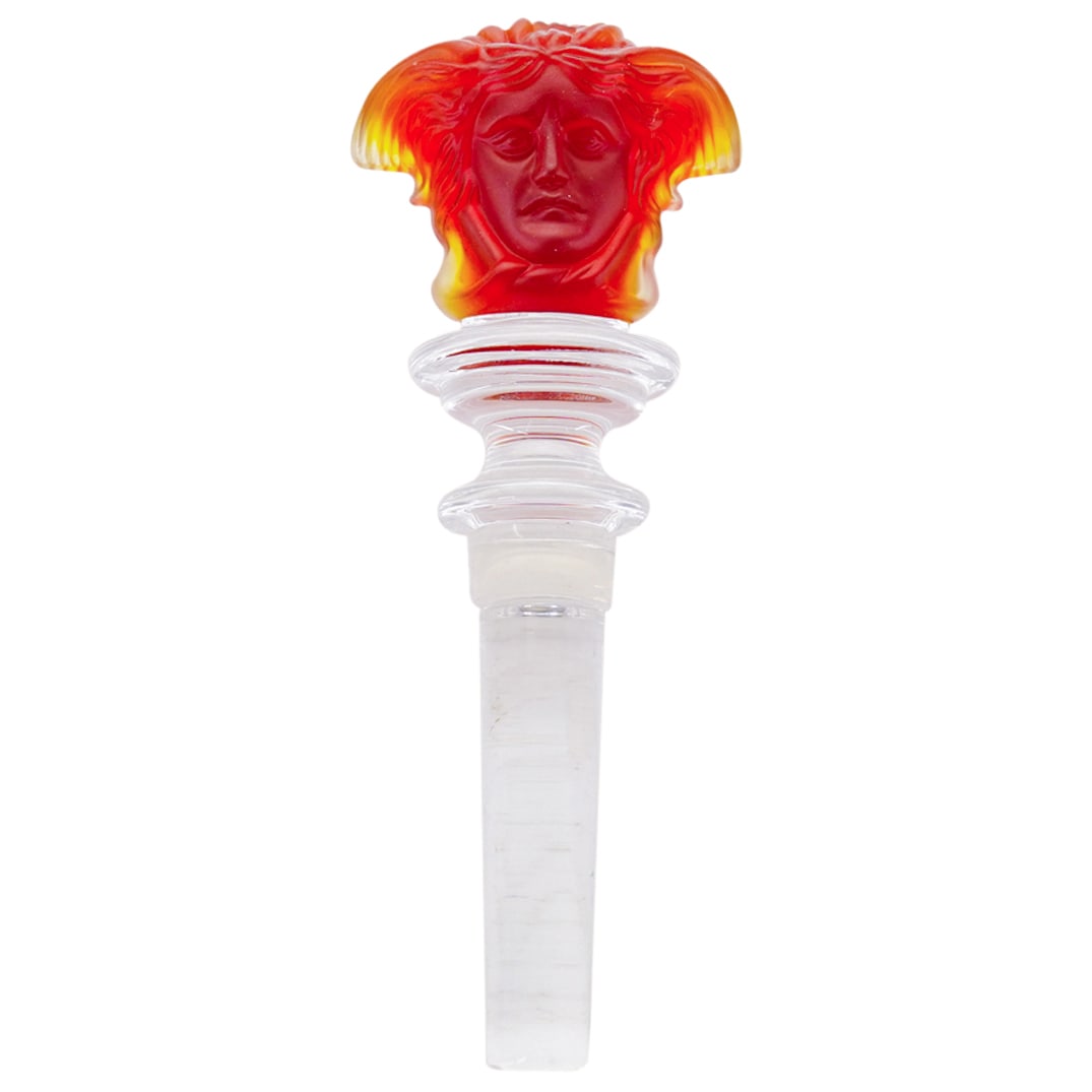 Rosenthal Versace Crystal Medusa Stopper: DESCRIPTION: A Rosenthal Versace stopper featuring a frosted dark amber colored head of Medusa along the top and clear crystal along the stem. Marked: "Rosenthal Versace". CIRCA: 20th Century ORIGIN: