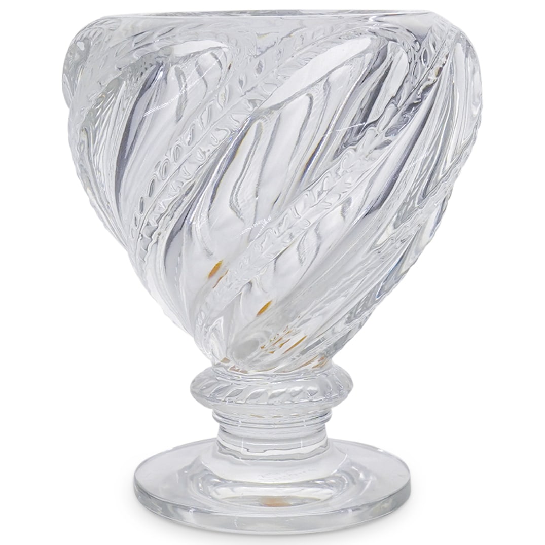 Lalique Crystal Footed Vase: DESCRIPTION: Lalique Crystal Footed Vase. In clear crystal embellished with bulbous, and leafy vine motifs. Marked with Lalique France etched signature on the underside. CIRCA: 20th Century ORIGIN: Fr