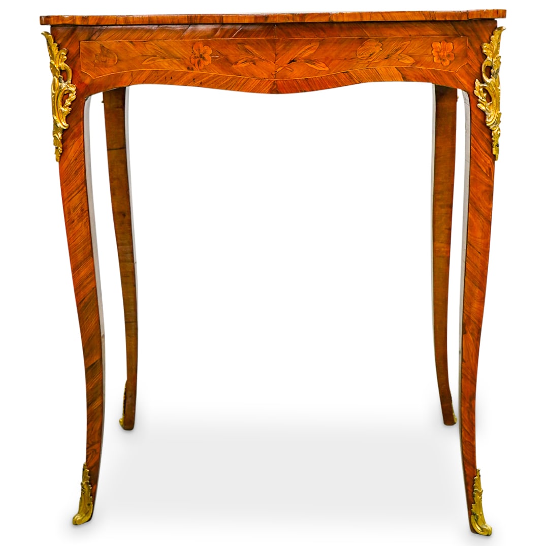 Louis XV Jean Ulrich Erstedt Table: DESCRIPTION: Louis XV side or occasional table, mark of Jean-Ulrich Erstedt, decorated with marquetry floral and foliage motifs, cabriole legs, and gilt bronze applications. Includes key. Marked with 