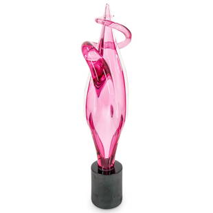 Elio Raffaeli, (Italian, b. 1936) Sculpture: DESCRIPTION: Elio Raffaeli, (Italian, b. 1936). Modernist twisted Murano leaf like form glass sculpture in a rose/pink glass on a black cylindrical black base. Artist signed on the bottom of the base.