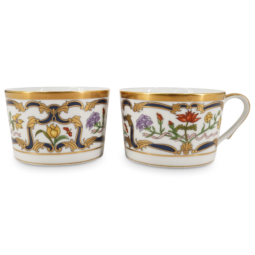 Pair of Christian Dior "Renaissance" Porcelain Teacups: DESCRIPTION: Pair of Christian Dior "Renaissance" Porcelain Tea Cups decorated along the body with floral vine motifs and gilt accents. Marked underneath "Christian Dior Fine China Renaissance". CIRCA