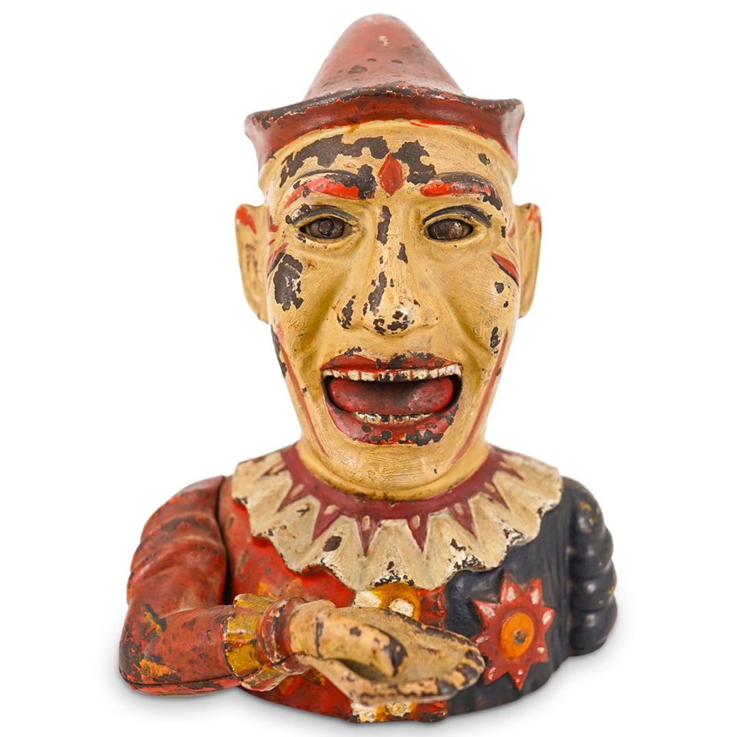 Antique Humpty Dumpty Mechanical Iron Bank: DESCRIPTION: Antique cast iron Humpty Dumpty Bank by the Shepard Hardware Company featuring original paint job and functioning mechanism connecting arm to mouth and eyes for coin deposit. Verso: "HUMP
