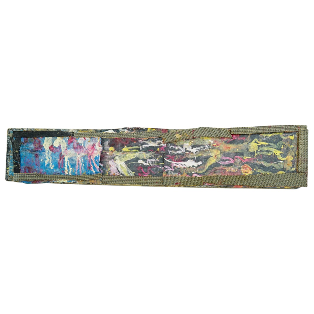 Purvis Young (American. 1943) Mixed Media Painting: DESCRIPTION: A Purvis Young (American, 1943-2010) mixed media painting executed on a rectangular found plywood panel. The painting depicts various figures painted over found material glued to the pane