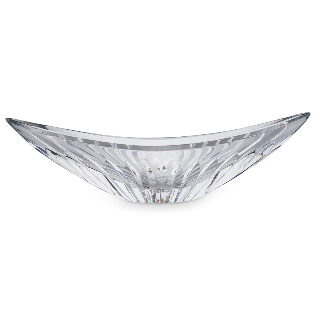 Baccarat Crystal Centerpiece Bowl: DESCRIPTION: Baccarat clear crystal centerpiece bowl with ovoid form and faceted design. Marked with acid stamped Baccarat seal. Provenance: From a prominent South Beach Estate. CIRCA: 20th Cent. ORIG