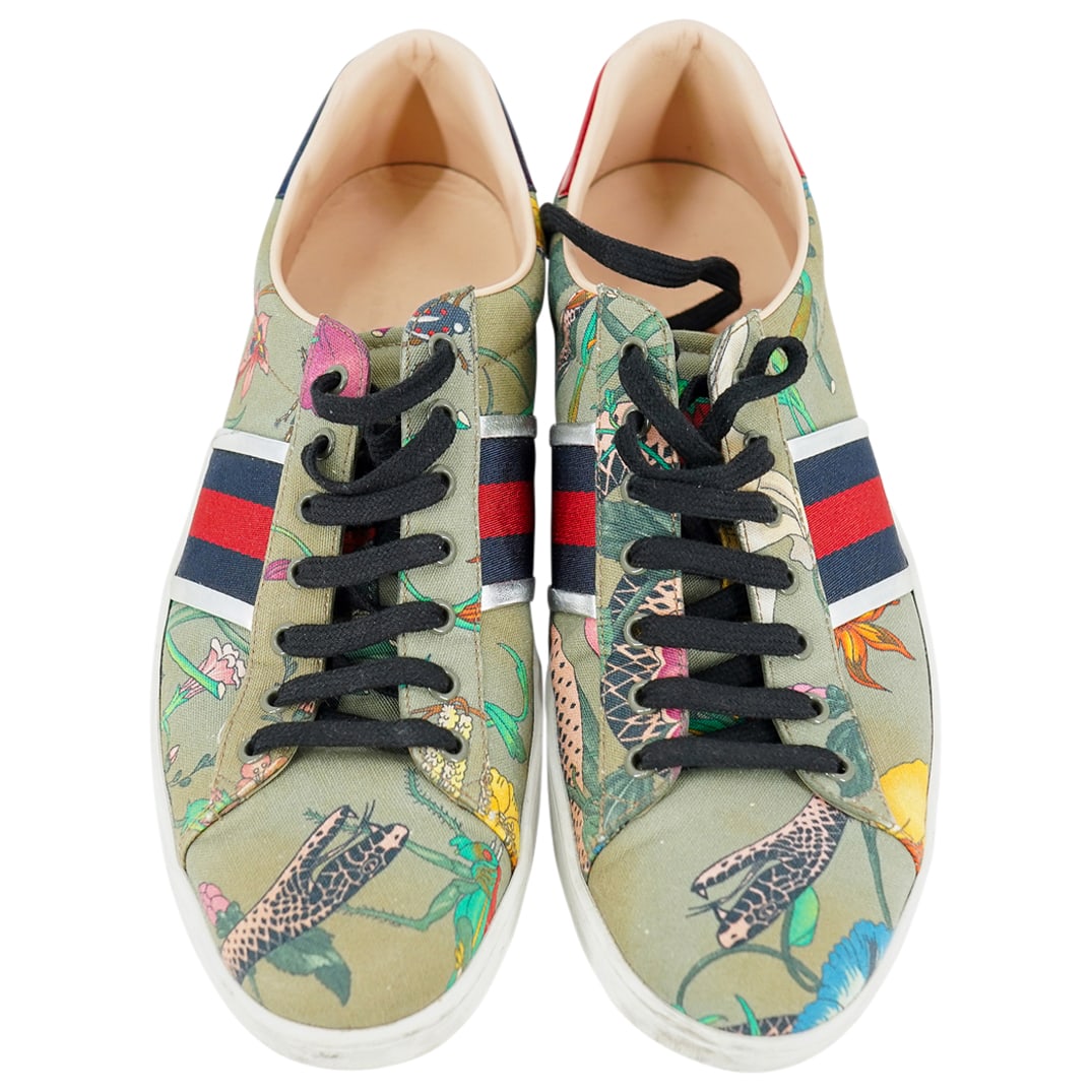 Gucci Mens Ace Sneakers Floral Snake: DESCRIPTION: Designer Gucci Mens Ace sneaker floral snake, depicting printed canvas with floral motifs and large snake, on a green background. With metallic leather accents. Numbered 473763. Size 12.