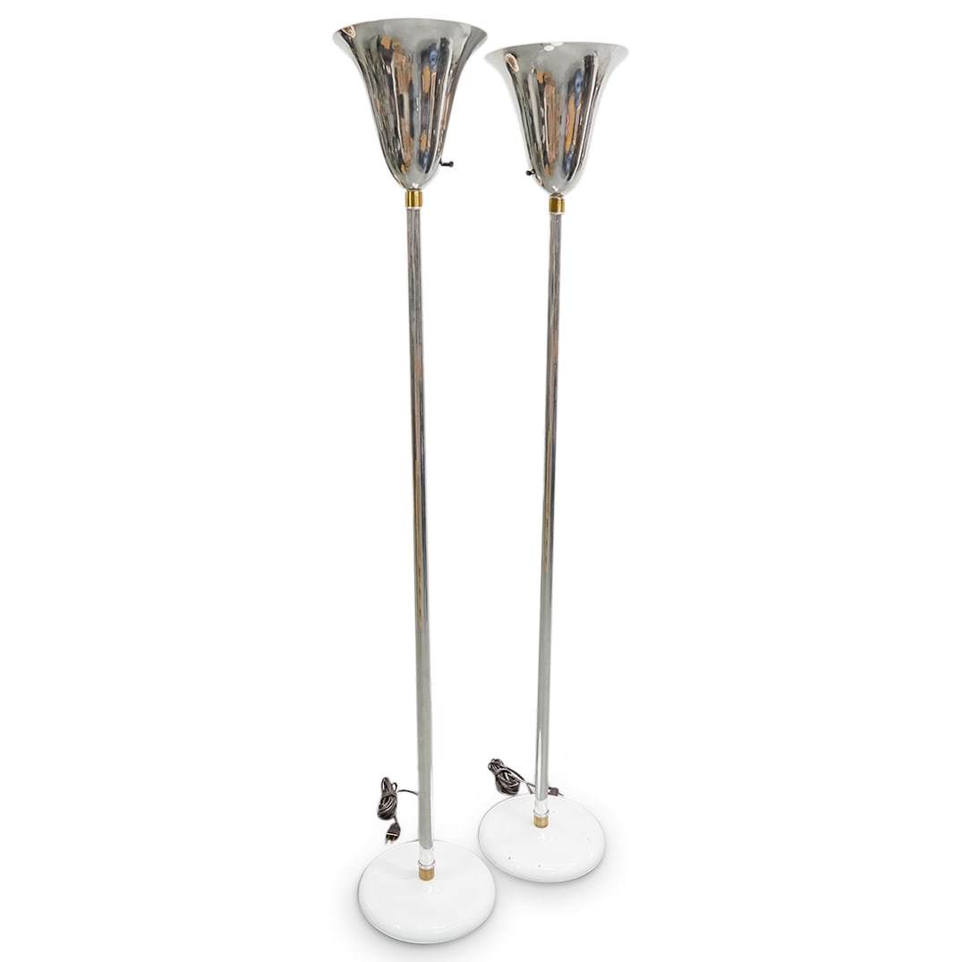 Pair Of Russel Wright Torchiere Floor Lamps: DESCRIPTION: Two matching floor lamps designed by Russel Wright, each featuring a silver tone body on a white, steel base and gilt rings around the stem immediately below the shade. Tested and fully f
