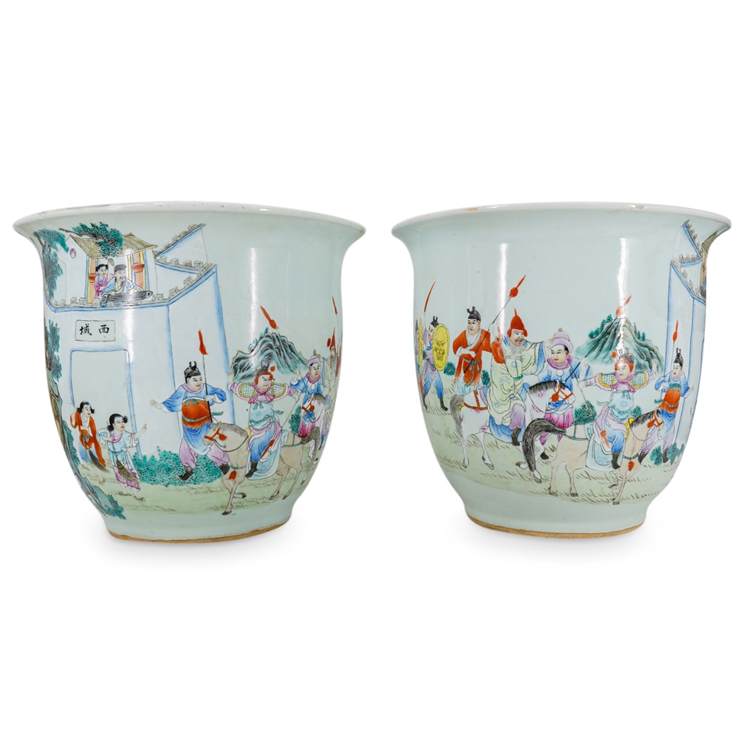 Pair Of Antique Chinese Wucai Porcelain Mirrored Jardinieres: DESCRIPTION: Two mirrored jardiniers, each depicting a train of warriors approaching a castle populated by a scholar attended by three children. Provenance: From a prominent South Beach Estate. CIRCA: