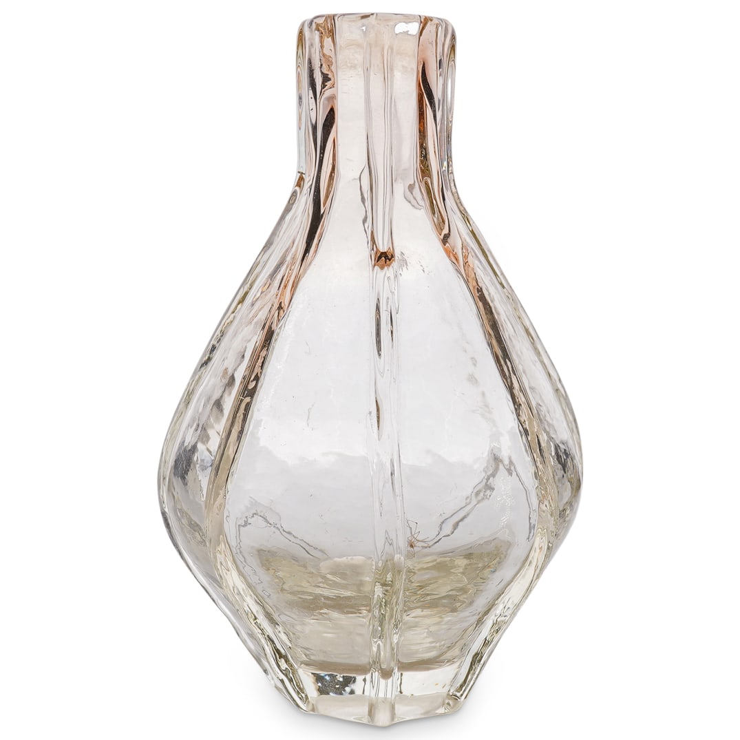 Ribbed Art Glass Vase: DESCRIPTION: Art glass vase, in colored and colorless glass, featuring eight vertical ribs. Unsigned. CIRCA: 20th century ORIGIN: Unknown DIMENSIONS: H: 8.25" Diameter: 5.5" CONDITION: Moderate scratc