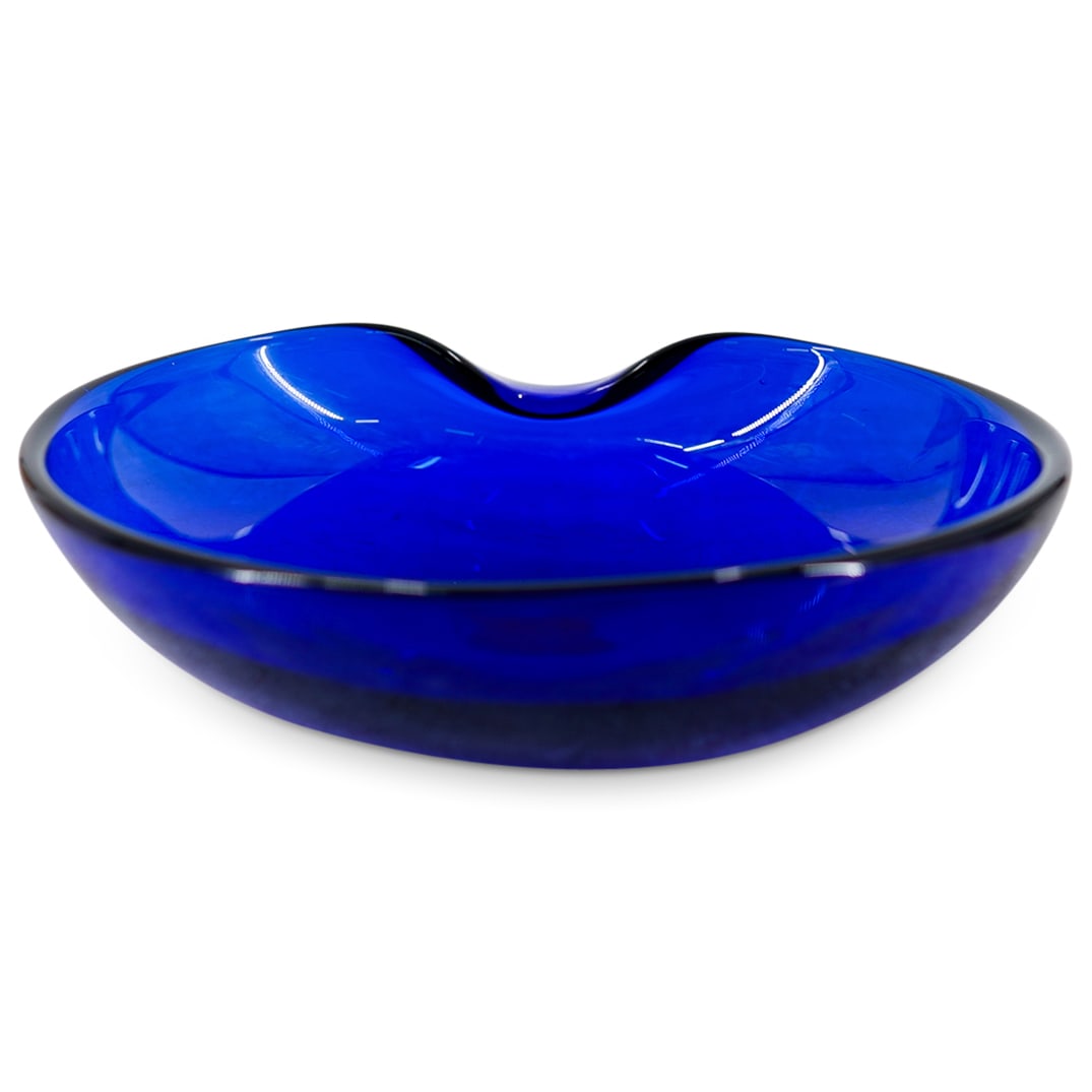 Elsa Peretti for Tiffany & Co. Cobalt Blue Thumbprint Bowl: DESCRIPTION: Elsa Peretti for Tiffany & Co. Cobalt Blue Thumbprint Bowl, engraved "Elsa Peretti for Tiffany" on the bottom. CIRCA: Late 20th century. ORIGIN: Italy DIMENSIONS: H: 2" D: 7.25 CONDITION: